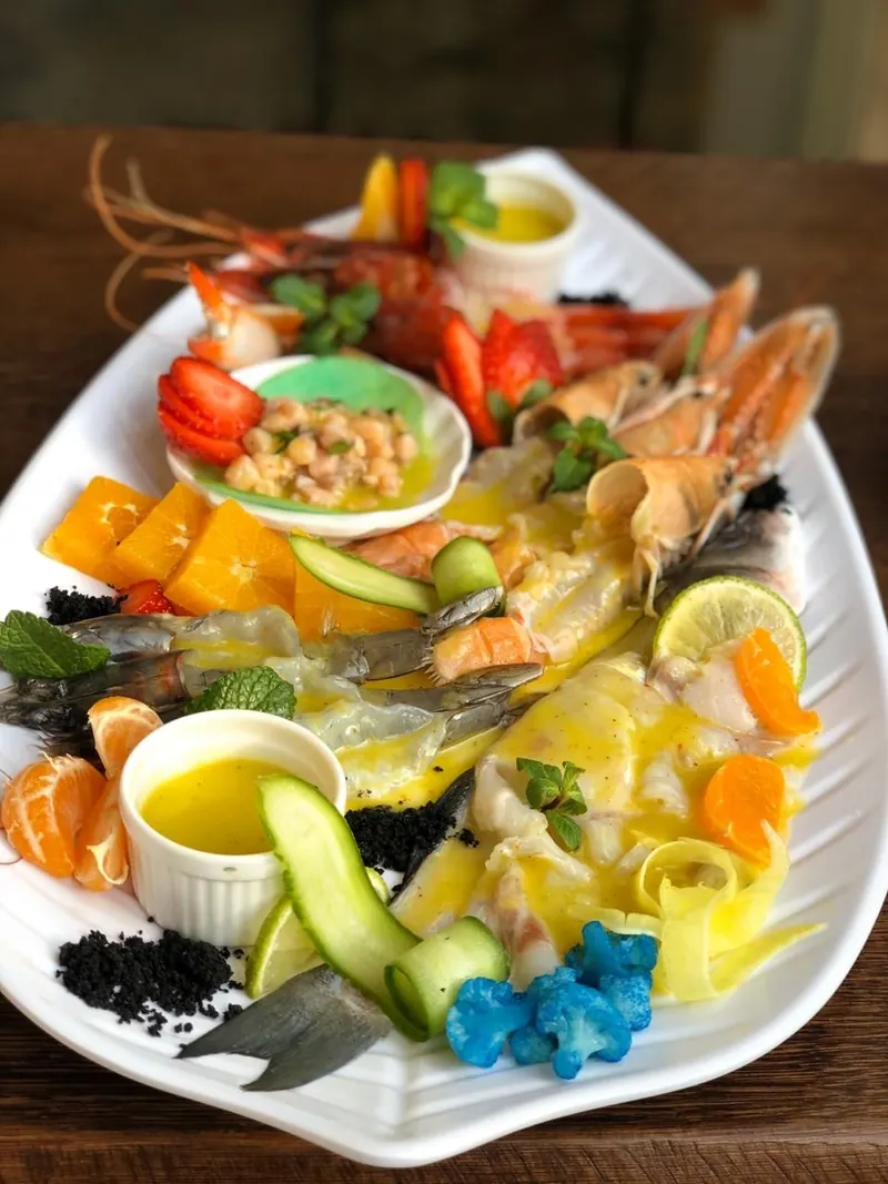 Raw seafood platter with langoustines, citrus and cucumber ribbons